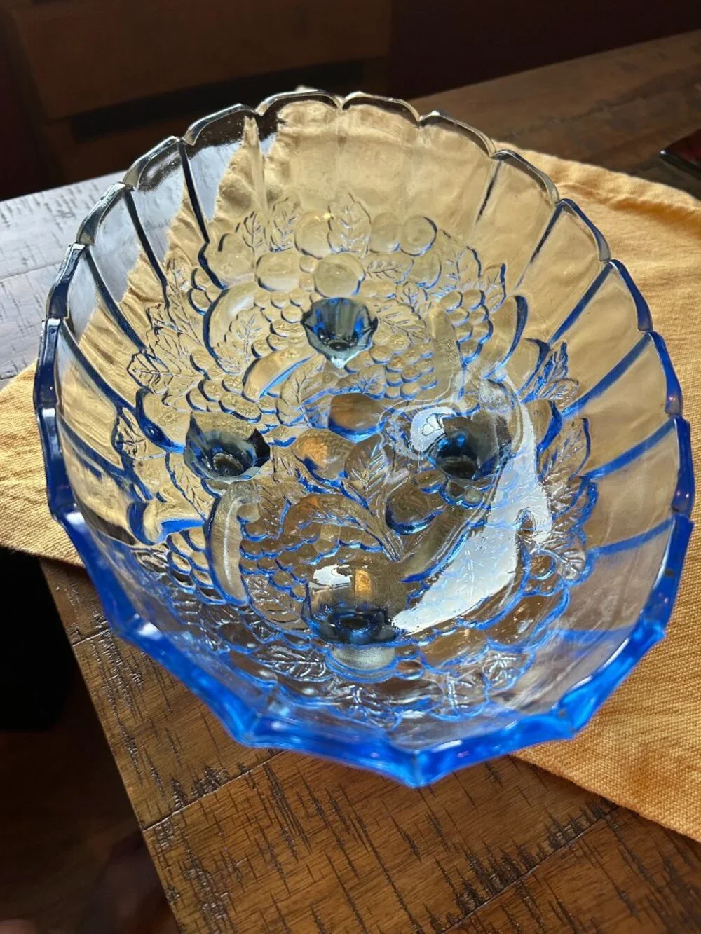 Vintage Indiana Glass  fruit   bowl   is a footed  oval  centerpiece  with a  sc